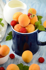 Raspberries and apricots