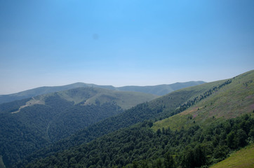 Carpathian mountains summer landscape  with green sunny hills