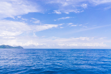 Summer landscape with sea and horizon over water