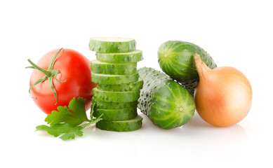 Fresh Tomato, Cucumbers, Onion and Parsley isolated on white background