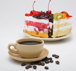 cup of coffee and delicious cake on white background