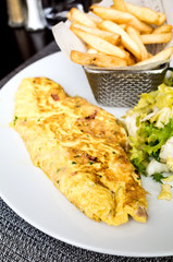 omelet with ham tomato and green salad