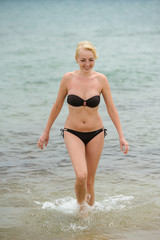 happy girl on the sea beach