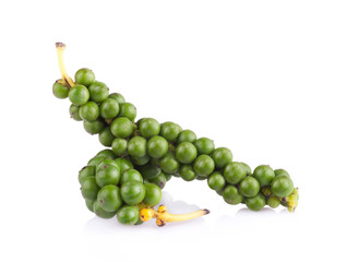 green color black pepper on white background
