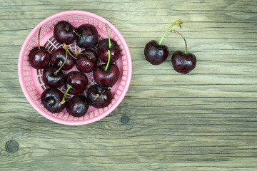 fresh cherries on wooden table.Selective focus.