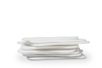 Stack of flat white foam trays isolated on white background