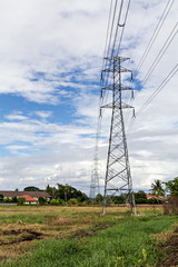 high voltage post.High-voltage tower on blue sky