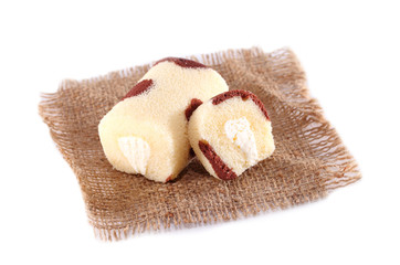 Sweet roll cake isolated on white