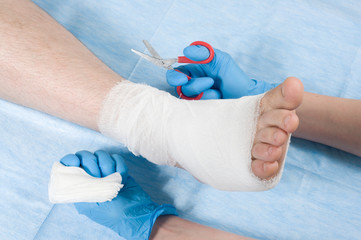 bandaged leg plaster in operating