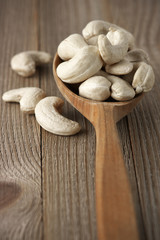 Cashew nuts in wooden spoon
