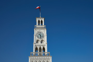 Historic clock tower in Plaza Arturo Prat in the old quarter of Iquique on the Pacific coast of...