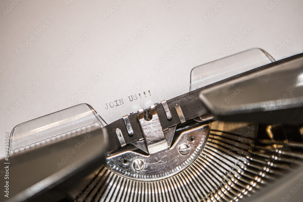 Fototapete old typewriter with text join us