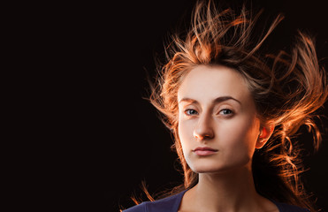 woman with hair flying