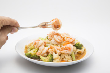 Thai healthy food stir-fried broccoli, carrot and shrimp