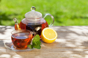 Breakfast tea on table in garden