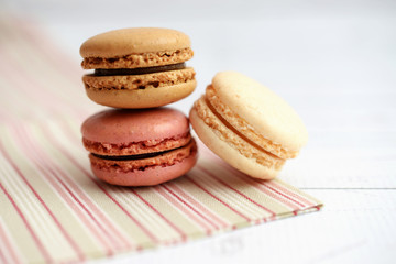 Colorful macaroons on napkin