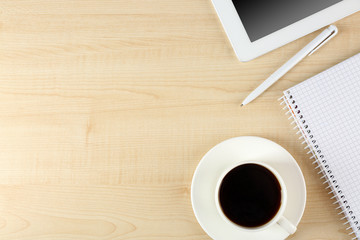 Top view of working place elements on wooden table