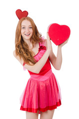 Pretty young model in mini pink dress holding gift box isolated