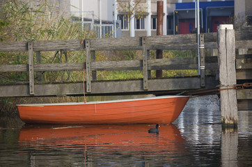 Fototapeta na wymiar red rowing boat