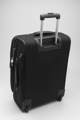Black suitcase isolated on white background