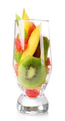 Fresh fruits salad in glass isolated on white