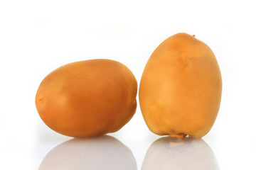 Yellow Dates fruits on white Background