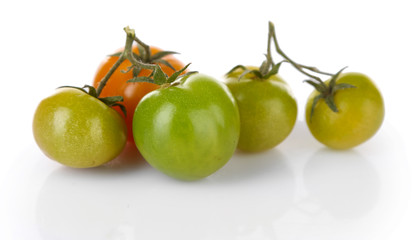 Green tomatoes isolated on white