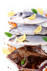 Fresh fishes and shrimps with spices  close up