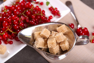 Ripe red currants with lamp sugar, closeup