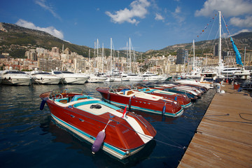 Monaco, Monte-Carlo, 25.09.2008: Yacht Show, Port Hercule, luxury yachts in harbor of Monaco, Etats-Uni, Piscine, Hirondelle, riva boats parking - obrazy, fototapety, plakaty