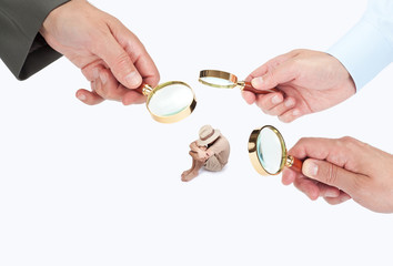Hands with magnifier glasses looking, studying or selecting a person
