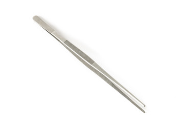 metal tweezers isolated over the white background