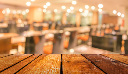 Coffee shop blur background with bokeh image .