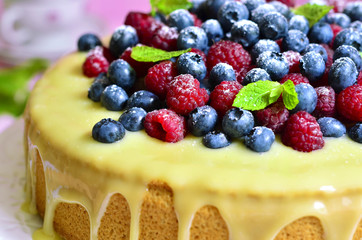 Berry cake with white chocolate glaze.