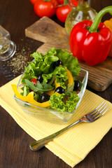 fresh vegetable salad in bowl on table close up
