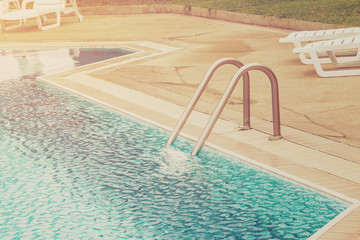 Swimming pool and stairs with vintage effect.