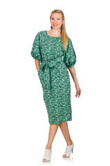 Young woman in green dress isolated on white