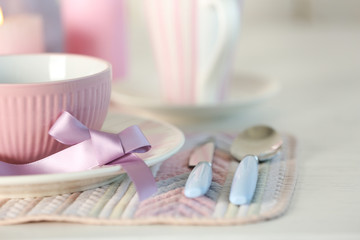 Beautiful holiday table setting in pink color