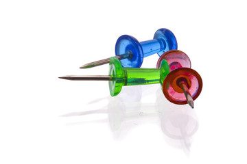 Pins with reflections, white background