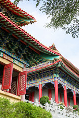 Naklejka premium Chinese pavilion in chinese temple and trees framed