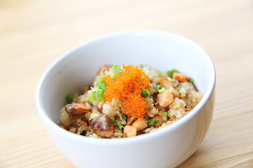 Japanese Salmon fried rice on wood background