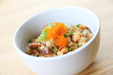 Japanese Salmon fried rice on wood background