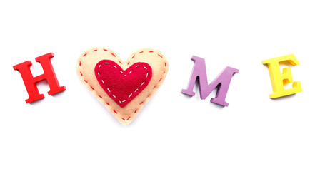 Decorative letters forming word HOME with heart isolated on white