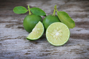 Lime on wooden background