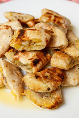 Grilled banana serve with syrup.