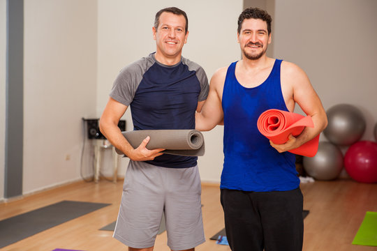 Male Friends Ready For Yoga Class