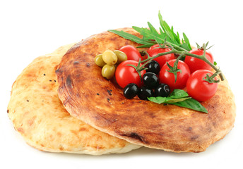 Pita bread and vegetables isolated on white