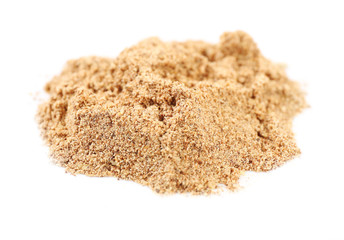 Pile of cinnamon isolated on white