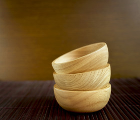 Wooden bowls with natural pattern, selective focus