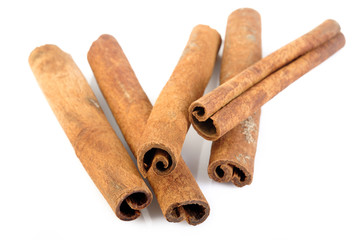 Cinnamon sticks isolated on white